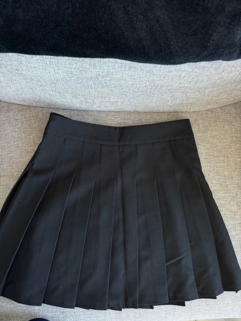 Pleated black skirt